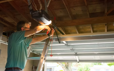 Technician performing professional garage door repair in Naples